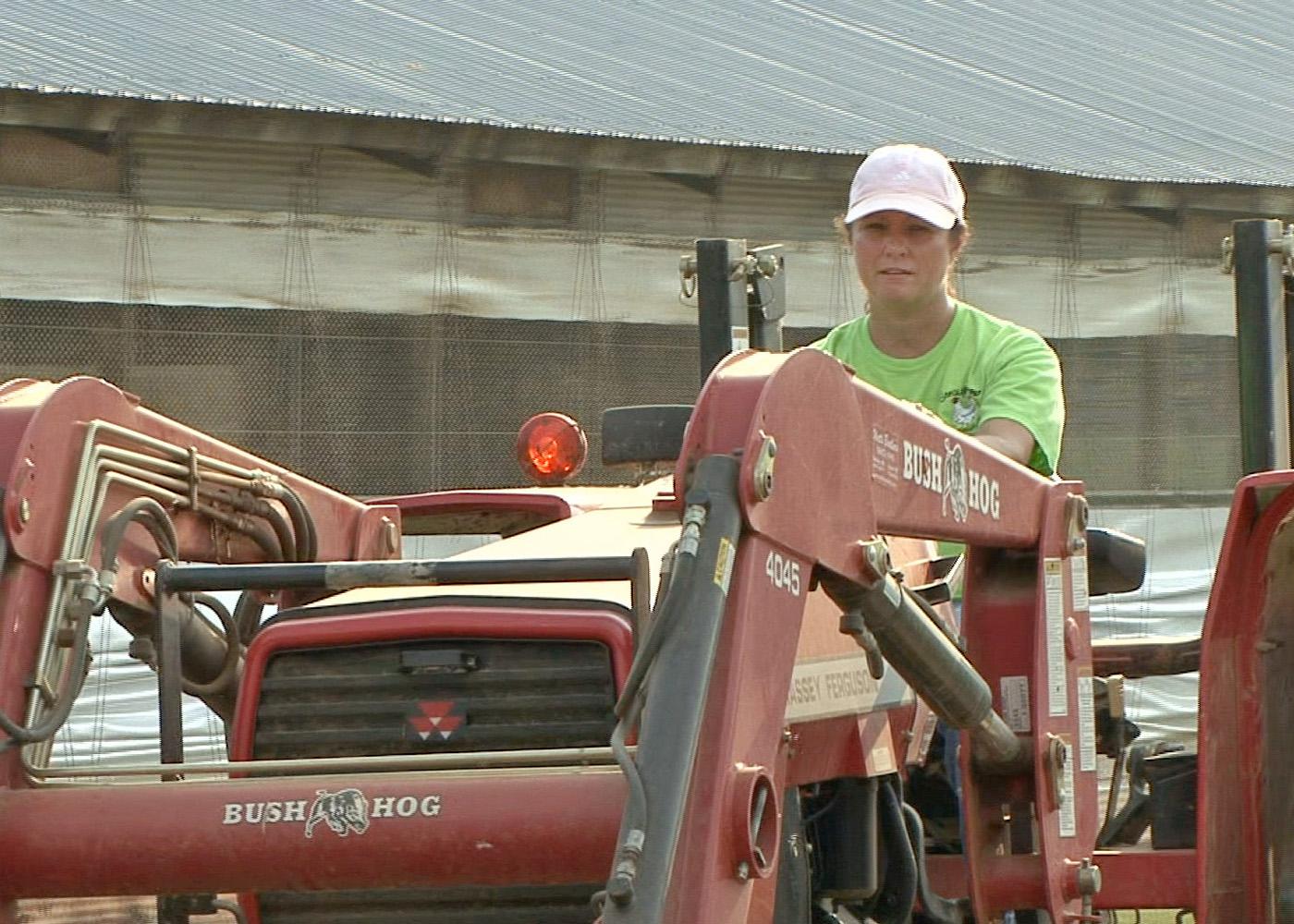 Poultry grower Delean Robertson of Pike County is one of the recent participants in the Women in Agriculture program. Robertson says she learned how to use updated technology and how to be a better manager of her poultry operation. (Photo by Amy Taylor)  