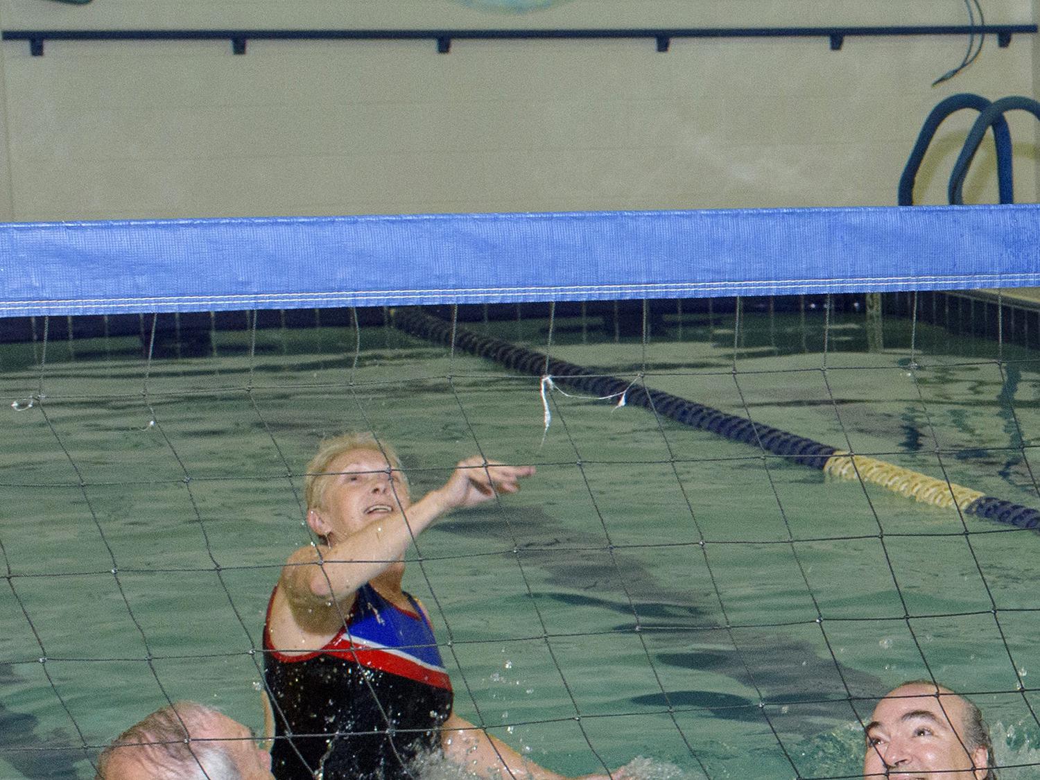 Adults enjoy a friendly game of water volleyball as they aim for at least 150 minutes of moderate exercise each week. (MSU Extension Service file photo/Kevin Hudson)