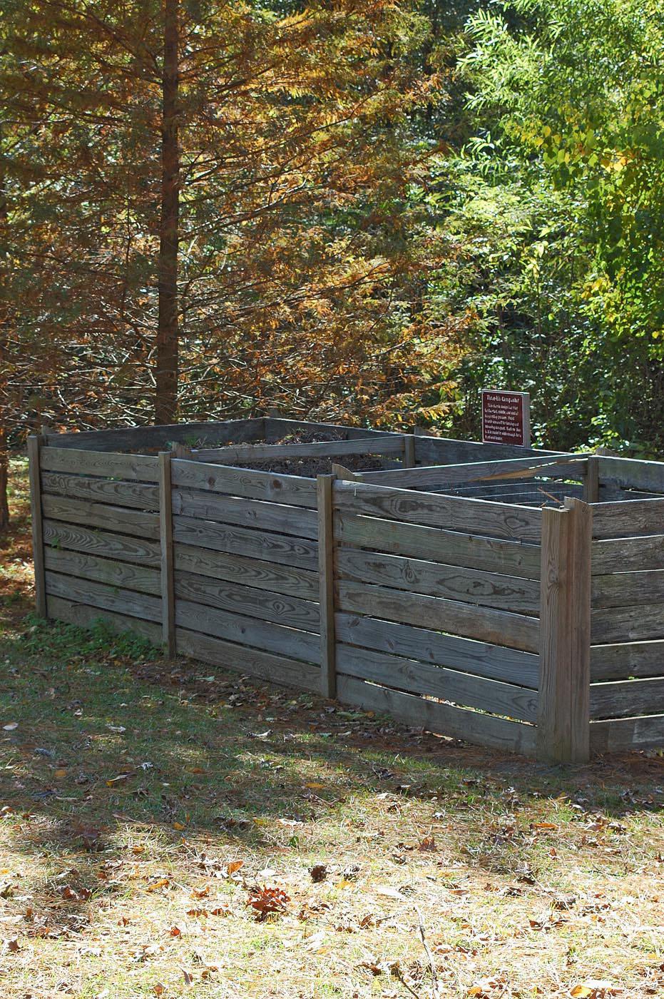 An Ocean Springs Master Gardener developed these three compost bins, which are more elaborate than most home gardeners create. Each bin holds compost at a different stage of decomposition. (Photos by Norman Winter)