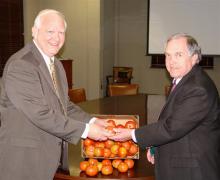 Mississippi Commissioner of Agriculture and Commerce Lester Spell, left, and Vance Watson, Mississippi State University vice president of agriculture, forestry and veterinary medicine, visited the Truck Crops Branch Experiment Station in Crystal Springs during the 17th annual Tomato Producers Short Course on March 5. (Photo by Andy Prosser, Department of Agriculture and Commerce)