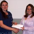 Laramy Cummings, right, is presented the Mississippi Eventing and Dressage Association/Sherry Levin Memorial Scholarship. Jenna Schilling, MEDA membership coordinator, presented the award. (Photo by Wes Schilling/MSU)