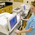 Jessica Walker, a class of 2012 CVM student at Mississippi State University, prepares blood samples at the diagnostic laboratory in Starkville. (Photo by Tom Thompson)