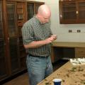 Mississippi State University plant pathologist Tom Allen checks cotton seedlings for black root rot disease, a fungus that causes plants to rot from the roots. (MSU Delta Research and Extension file photo)