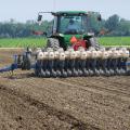 A Mississippi State University farm worker is planting foundation seed of the Bowman rice variety in this field at the North Mississippi Research and Extension Center at Verona in 2009. Local seed companies and growers depend each year on MSU and the Mississippi Foundation Seed Stocks to provide quality foundation seed of improved varieties. (Photo by /Mississippi Foundation Seed Stocks/ Randy Vaughan) 