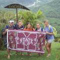 Mississippi State University College of Veterinary Medicine students (from left to right) Brolin Evans, Katie Cooley, Kellie Horton, Stephanie Starling and Brittany Fisher display their MSU pride while volunteering in Sanchiri, Costa Rica. (Photo submitted)