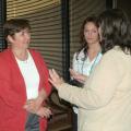 Ruth Hambleton (left), who founded Annie's Project in 2003, talks with graduates of the program May 7 at the program's 10th anniversary celebration. Annie's Project teaches females in agriculture-related fields problem-solving, record keeping and decision-making skills. (Photo by MSU Ag Communications/Susan Collins-Smith)