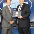 Ryan Akers, an assistant Extension professor in the Mississippi State University School of Human Sciences, left, receives Champions of Change recognition from Federal Emergency Management Agency administrator Craig Fugate at recent ceremonies in Washington, D.C. Additionally, the Mississippi Youth Preparedness Initiative, which is coordinated by Akers, won the national FEMA Individual and Community Preparedness Award for Most Outstanding Youth Preparedness program. (Submitted photo)