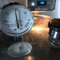 Closeup of a dial on a pressure canner.